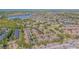 An aerial view shows well-maintained condominiums with views of a pond at 6229 Bayside Key Dr, Tampa, FL 33615