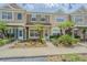 Charming townhome exterior with landscaped walkway and inviting entrance at 6229 Bayside Key Dr, Tampa, FL 33615