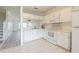 Well-lit kitchen features tiled floors and stainless steel appliances at 6229 Bayside Key Dr, Tampa, FL 33615