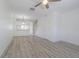Bright, open-concept living area showcasing neutral tones and modern flooring at 6229 Bayside Key Dr, Tampa, FL 33615