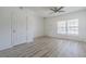 Bright living area with modern flooring, ceiling fan, and neutral tones at 6229 Bayside Key Dr, Tampa, FL 33615