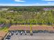 Aerial view of a community with lush greenery and ample parking at 7124 Barclay Ave # A, Spring Hill, FL 34609