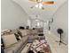 Spacious living room with comfortable seating, tile flooring, and great natural light at 7124 Barclay Ave # A, Spring Hill, FL 34609