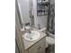 Standard bathroom with vanity, mirror, toilet, and shower with curtain at 7187 53Rd N St, Pinellas Park, FL 33781