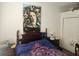 Cozy bedroom featuring an art piece, comfortable bed, and ample natural light at 7187 53Rd N St, Pinellas Park, FL 33781