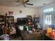 Cozy living room with natural light featuring a ceiling fan and an open layout at 7187 53Rd N St, Pinellas Park, FL 33781
