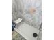 Accessible shower with textured walls and a built-in seat at 7187 53Rd N St, Pinellas Park, FL 33781