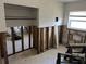 A view of the room being renovated showing exposed framework at 7333 Royal Palm Dr # 34652, New Port Richey, FL 34652