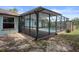 A screened patio and pool area enhance outdoor living, providing a perfect entertainment space at 8332 Berkeley Manor Blvd, Spring Hill, FL 34606