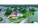 Aerial view of the community pool, recreation center, and surrounding neighborhood at 8471 Fantasia Park Way, Riverview, FL 33578