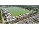 Panoramic aerial view of a community with a large lake, illustrating the property's desirable location and scenic surroundings at 8471 Fantasia Park Way, Riverview, FL 33578