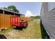 View of the backyard with a fence and trailer at 8471 Fantasia Park Way, Riverview, FL 33578