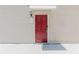 Front door with awning and fresh paint at 8471 Fantasia Park Way, Riverview, FL 33578