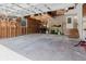 Spacious garage featuring ample storage shelves, a workspace, and stairs to the entry door at 8471 Fantasia Park Way, Riverview, FL 33578