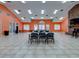 Large recreation room featuring an open floor plan and ample seating arrangement with tiled floors at 8471 Fantasia Park Way, Riverview, FL 33578