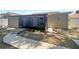 View of backyard with a screened in lanai and lush greenery at 8812 Bayaud Dr, Tampa, FL 33626