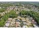 An attractive neighborhood featuring tree-lined streets, lush landscaping, and stunning water features at 892 Crestridge Cir, Tarpon Springs, FL 34688