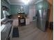Well-equipped kitchen with modern appliances and ample counter space for meal preparation at 10142 118Th Ave, Largo, FL 33773