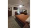 Spacious main bedroom featuring hardwood floors and ample closet space for storage at 10142 118Th Ave, Largo, FL 33773