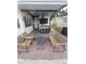 Entertaining backyard featuring a covered bar area and patio seating on brick pavers at 10142 118Th Ave, Largo, FL 33773
