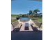 Backyard area with above-ground stock tank pool, patio furniture, and landscaped surroundings at 10142 118Th Ave, Largo, FL 33773