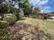 A spacious backyard shows the outdoor area with ample space and privacy at 10308 Fore Dr, Tampa, FL 33612