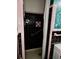 Shower with pink and black tiling at 10308 Fore Dr, Tampa, FL 33612