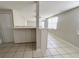 The kitchen features tiled floors, a center island and plenty of natural light to enjoy meal prep at 10367 109Th Ave, Largo, FL 33773