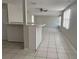 The kitchen features tiled floors, a center island and plenty of natural light to enjoy meal prep at 10367 109Th Ave, Largo, FL 33773