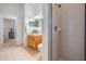 Hall bathroom with updated vanity and tiled walk-in shower at 10641 Cory Lake Dr, Tampa, FL 33647