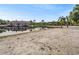 Community beach with a sand volleyball court, clubhouse and pond, perfect for relaxing, swimming, and beach games at 10641 Cory Lake Dr, Tampa, FL 33647