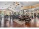 Spacious clubhouse featuring seating areas, tables, high ceilings, and large windows offering lots of natural light at 10641 Cory Lake Dr, Tampa, FL 33647