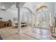Spacious foyer featuring decorative tile flooring, grand columns and lots of natural light at 10641 Cory Lake Dr, Tampa, FL 33647