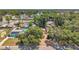 Aerial view of the neighborhood showcasing the backyard and mature trees at 1117 Tyrone N Blvd, St Petersburg, FL 33710