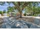A quaint home with a detached garage and mature trees in a quiet neighborhood at 1117 Tyrone N Blvd, St Petersburg, FL 33710