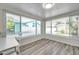 Bright sunroom featuring multiple large windows for ample natural light at 1117 Tyrone N Blvd, St Petersburg, FL 33710