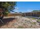 Large backyard with a pool, a fire pit and a wooded privacy fence at 11486 92Nd N St, Largo, FL 33773