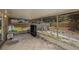 Enclosed patio area with a pool and outdoor play equipment set at 11486 92Nd N St, Largo, FL 33773