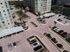 Well manicured landscaping surrounds luxury condominiums including attractive parking areas and entryways at 1180 Gulf Blvd # 306, Clearwater, FL 33767