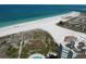 Expansive aerial view capturing the white sandy beach and turquoise waters of the Gulf Coast, showcasing the natural beauty at 1180 Gulf Blvd # 306, Clearwater, FL 33767
