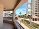 Wide balcony with resort views at 1180 Gulf Blvd # 306, Clearwater, FL 33767