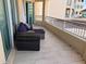 Comfortable outdoor seating and sunny views from this beautiful condo balcony at 1180 Gulf Blvd # 306, Clearwater, FL 33767