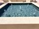 Outdoor fountain featuring multiple water jets in a square tiled pool at 1180 Gulf Blvd # 306, Clearwater, FL 33767