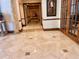 Spacious foyer featuring polished marble floors, classic columns, and grand entrance to home at 1180 Gulf Blvd # 306, Clearwater, FL 33767