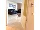 Living room featuring marble floors, comfortable leather seating, and stylish decor at 1180 Gulf Blvd # 306, Clearwater, FL 33767