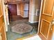 Gracious Lobby with carpet and entry doors at 1180 Gulf Blvd # 306, Clearwater, FL 33767