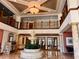 Grand lobby with fountain, mezzanine, columns, and luxurious details, offering a sense of elegance and sophistication at 1180 Gulf Blvd # 306, Clearwater, FL 33767