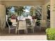 Outdoor seating area with dining tables offering serene community views at 1180 Gulf Blvd # 306, Clearwater, FL 33767
