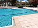 Community swimming pool featuring 4 ft depth and tiled deck at 1180 Gulf Blvd # 306, Clearwater, FL 33767