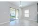 An inviting dining area features sliding glass doors leading to an outdoor space and backyard at 1210 Harbour Blue St, Ruskin, FL 33570